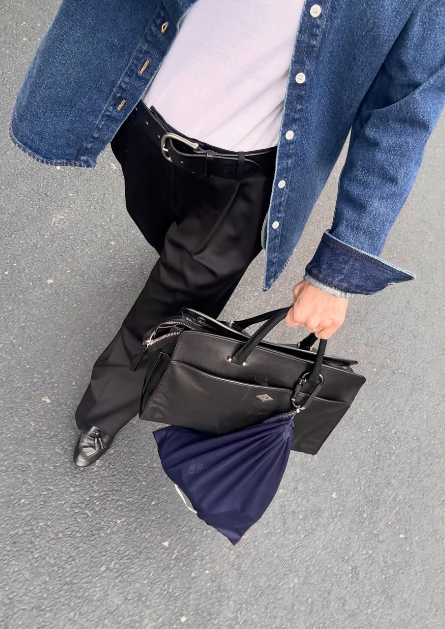 Black Private Eye carried with denim jacket and black trousers