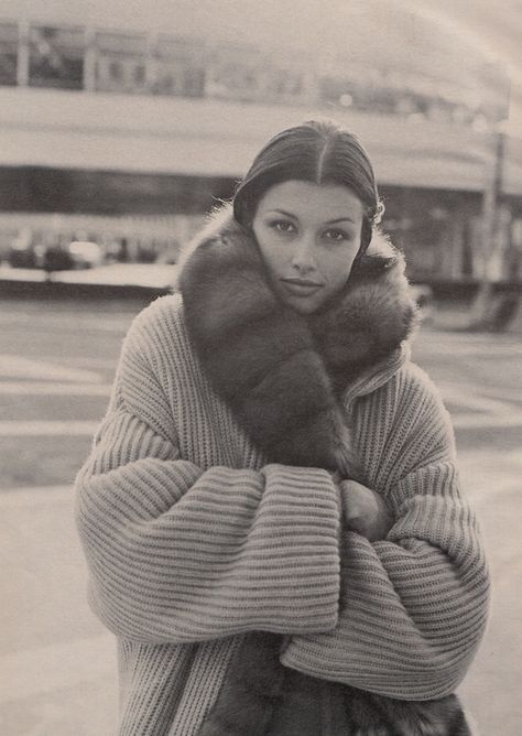 Vintage portrait with a generous fur collar and oversized knitwear