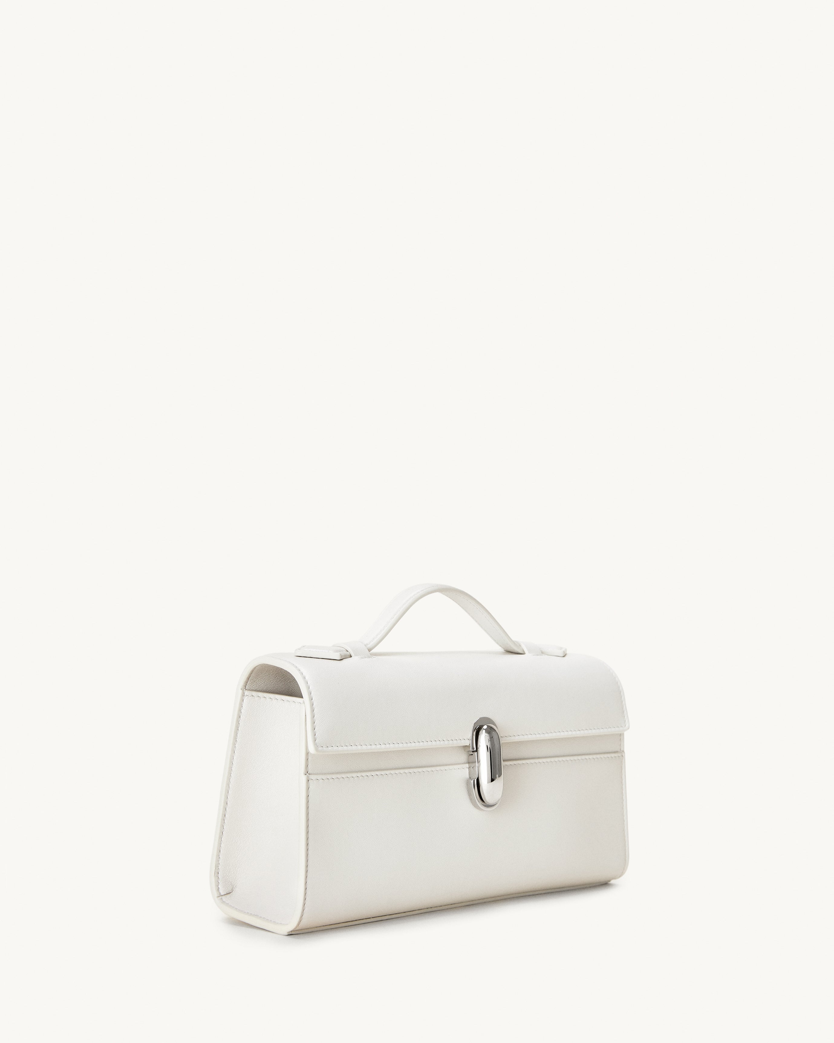side view of the Symmetry Pochette handbag in Ivory leather 