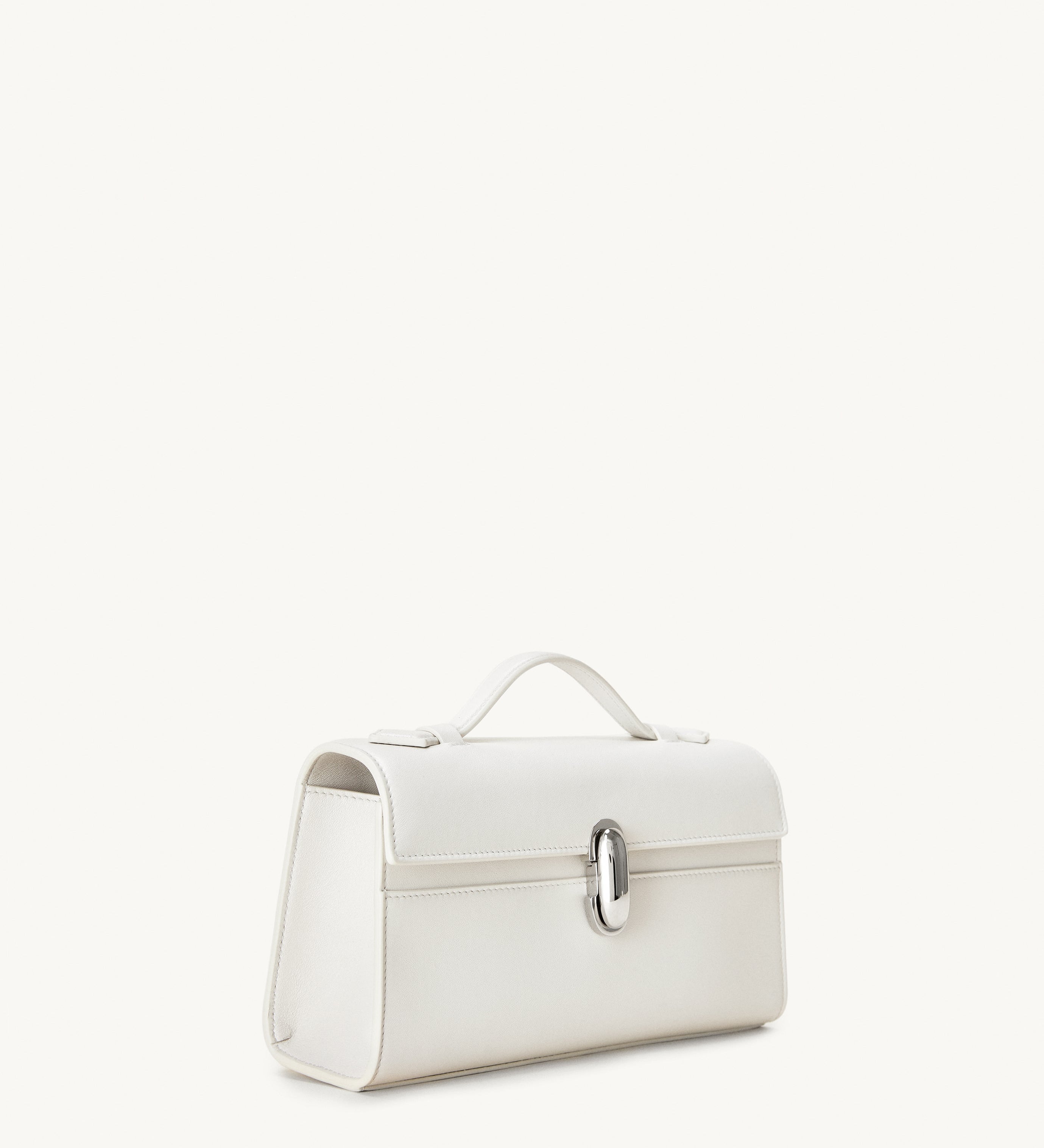 side view of the Symmetry Pochette handbag in Ivory leather 