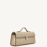 side view of the Slim Symmetry Pochette handbag in Bone leather 