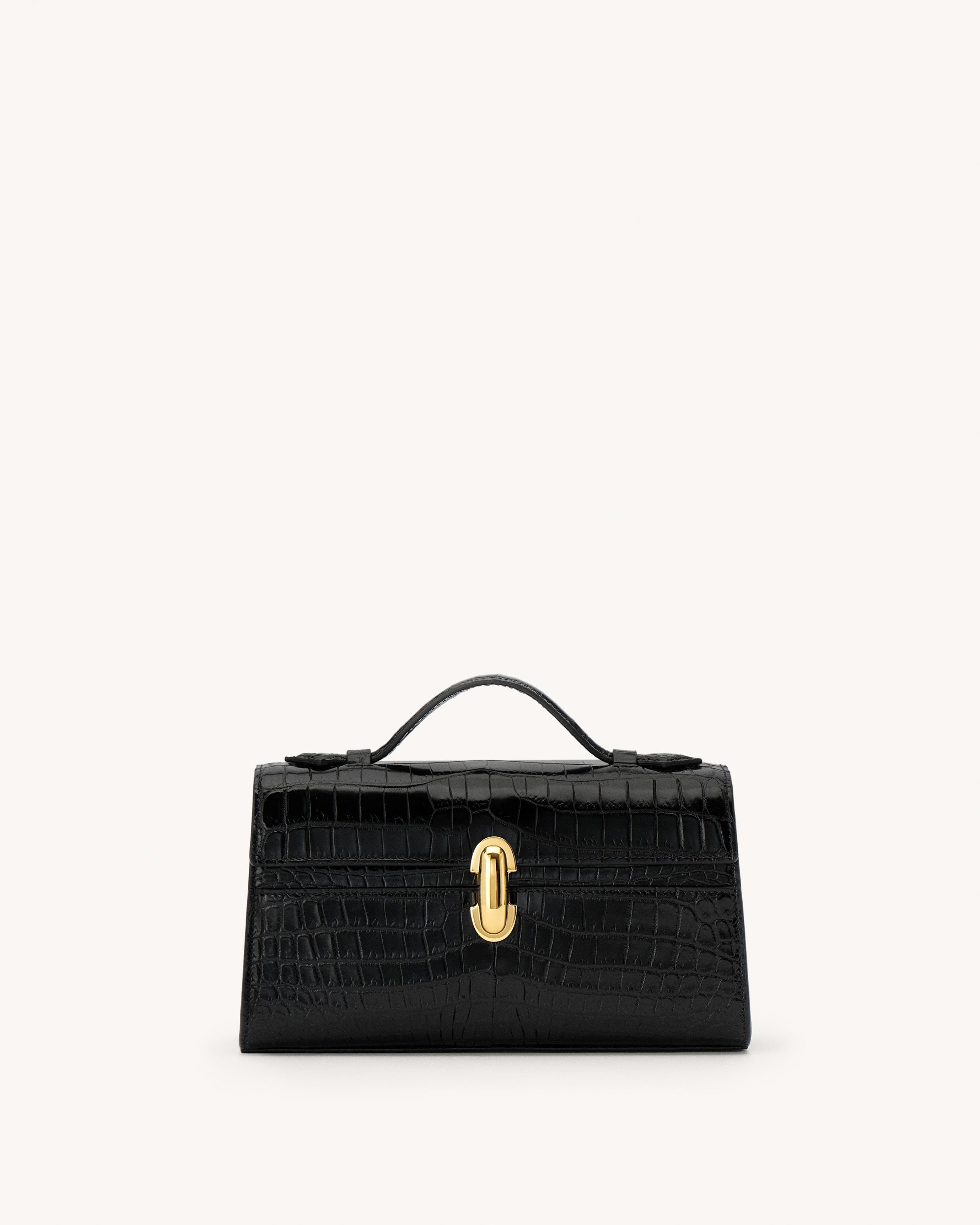 Black handbag with a gold clasp on a white background