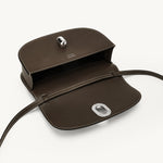 inside view of the Tondo Crescent handbag in Mink leather