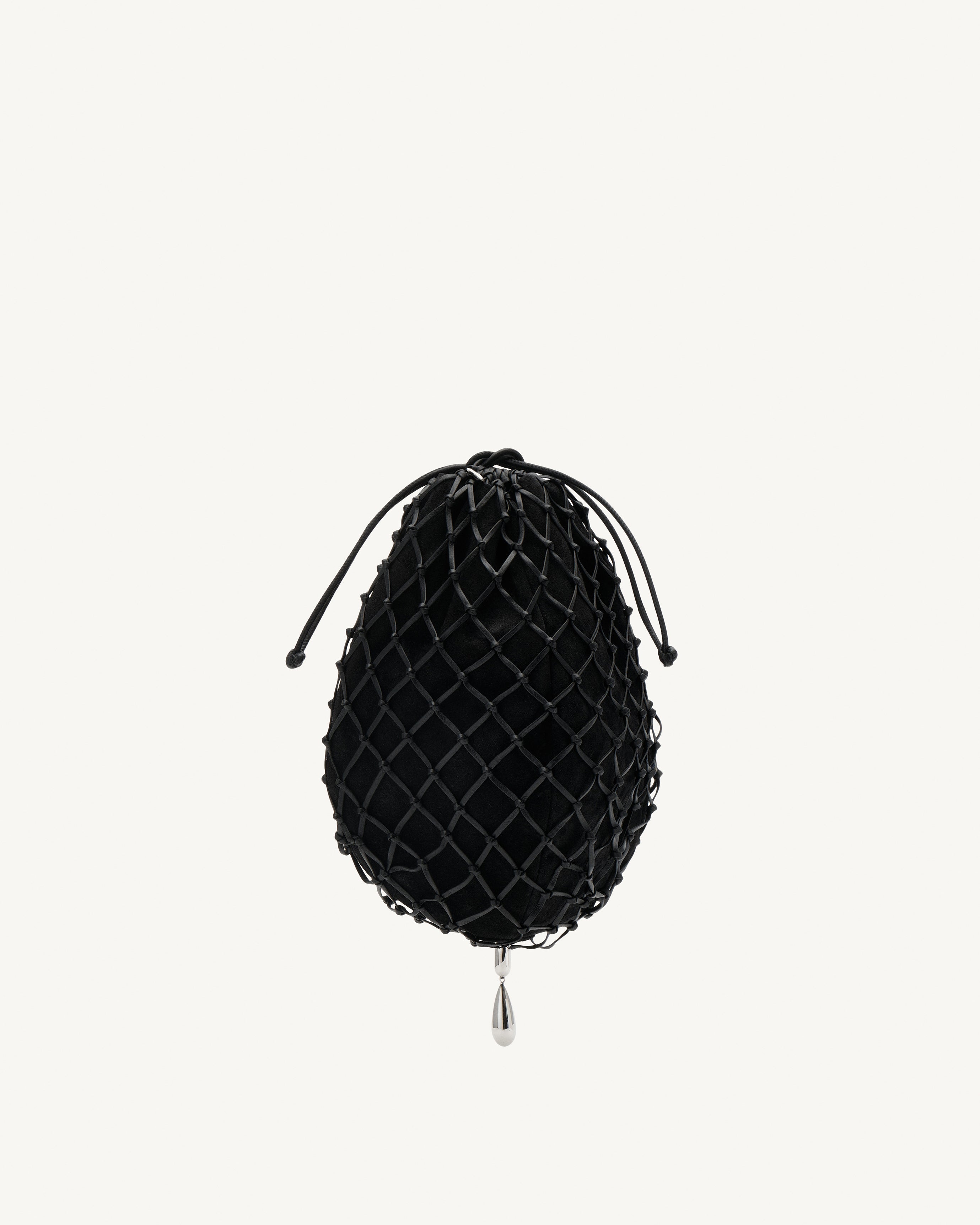 Front view with black macrame pouch with drawstring and silver hardware on a white background