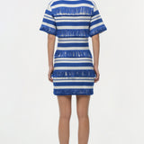 Blue and white striped knit mini dress with fringe trim details and short sleeves.