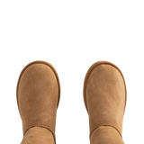 Image 4 of 4 - BROWN - Ugg Women's Classic Ultra Tall Boot is a sky-high version of the iconic style. Featuring a 15-inch shaft height, plush sheepskin lining, and an ultra-lightweight rubber outsole for comfort. Main Material: 17mm Twinface Sheepskin. Lining: 17mm Sheepskin. Insole: 17mm Sheepskin. Sole: Sugarcane EVA. Details: Overlock Stitch Seams. 
