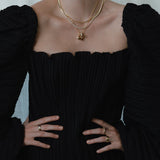 Kinn - Dirty Martini Charm