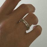 Kinn - Four Prong Eternity Ring Emerald
