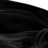Image 3 of 3 - BLACK - Balenciaga Women's Le City Small Bag is crafted from supple leather and features the house's iconic slouchy silhouette with rolled top handles, signature buckle detailing, and an adjustable, detachable shoulder strap for versatile styling. Designed with a spacious zip-top main compartment, this designer handbag blends Balenciaga's archival motorcycle-inspired aesthetic with everyday functionality. Main Material: Leather. Dimensions: 30 x 19 x 10 cm. Made in Italy.