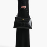 Khaite - Audrey Top Handle Bag in Black Alligator