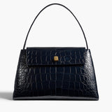 Khaite - Audrey Top Handle Bag in Midnight Alligator