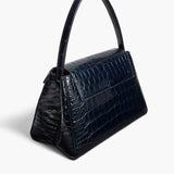 Khaite - Audrey Top Handle Bag in Midnight Alligator