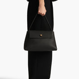 Khaite - Audrey Top Handle Bag in Black Pebbled Leather