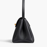 Khaite - Audrey Top Handle Bag in Black Pebbled Leather