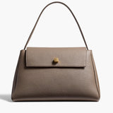 Khaite - Audrey Top Handle Bag in Elephant Pebbled Leather