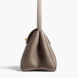 Khaite - Audrey Top Handle Bag in Elephant Pebbled Leather