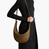 Khaite - Small Augustina Crossbody Bag in Dark Olive Pebbled Leather