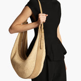 Khaite - Augustina Hobo in Wheat Suede and Natural Raffia