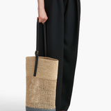 Khaite - Billie Bucket Bag in Natural and Lead Raffia