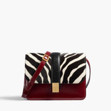 Khaite - Blake Crossbody Bag in Zebra Print Haircalf and Oxblood Leather