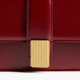 Khaite - Blake Long Clutch in Oxblood