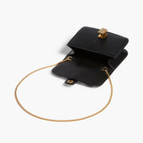 Khaite - Blake Nano Bag in Zebra Print Haircalf and Black Leather