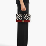 Khaite - Blake Top Handle Bag in Zebra Print Haircalf and Oxblood Leather