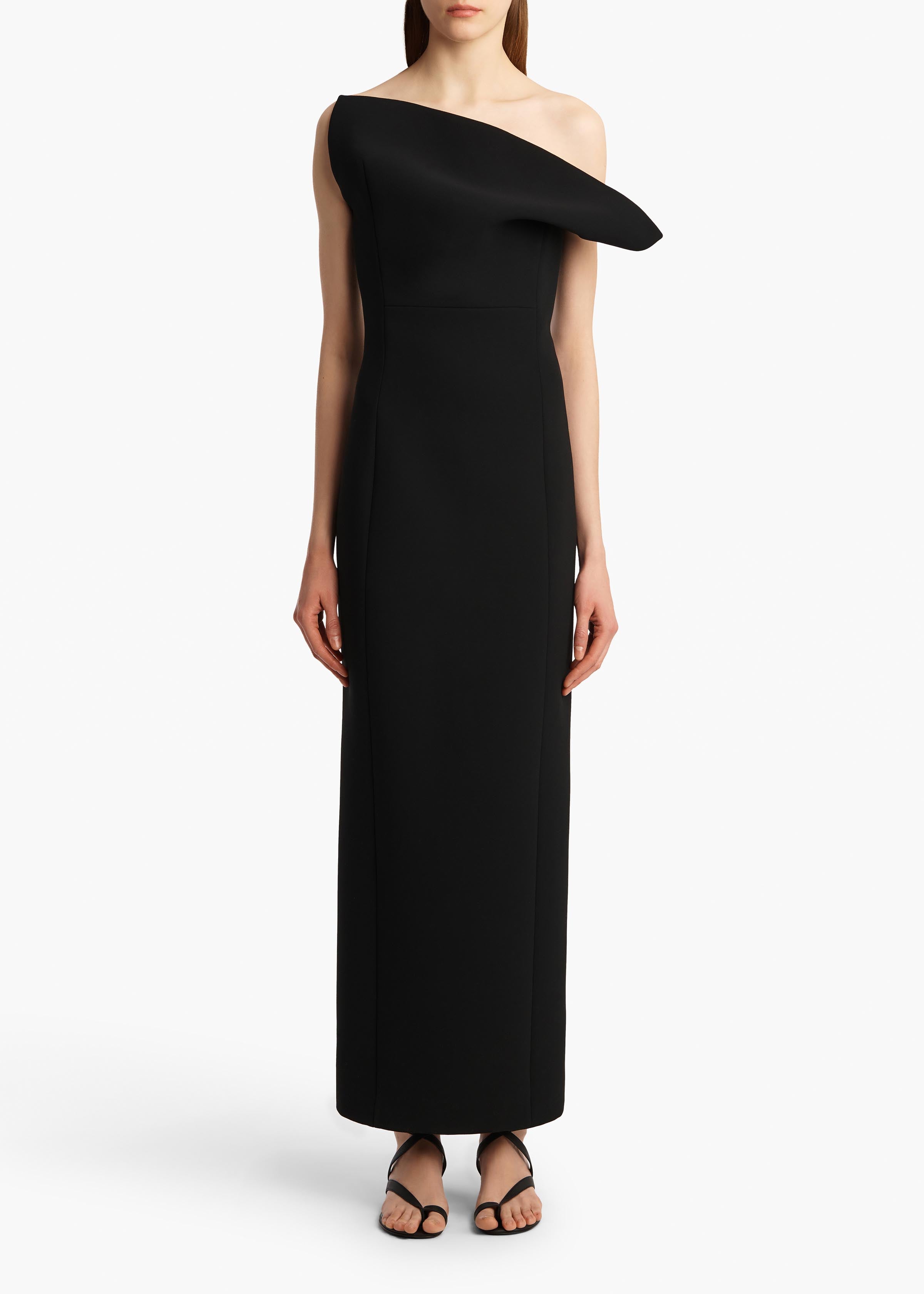 cato black dress M / bloom A little black dress is always the answer and this charming look is ready when you are A scoop neckline textured knit and flounced hem come together with a beltedtie waist for a flattering look that you can easily dress up or down for whatever the mood is calling for KHAITE Cato Dress in Black