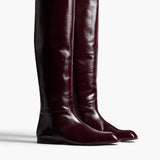Khaite - Colt Knee - High Boot in Bordeaux Glazed Leather