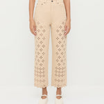 Demi Embroidered Pant in tan Japanese cotton twill with eyelet lace, Kerri Pointelle Tee in white cotton, and Cooper Natural Mary Jane Sneaker.