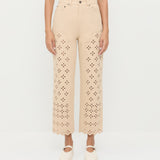 Demi Embroidered Pant in tan Japanese cotton twill with eyelet lace, Kerri Pointelle Tee in white cotton, and Cooper Natural Mary Jane Sneaker.