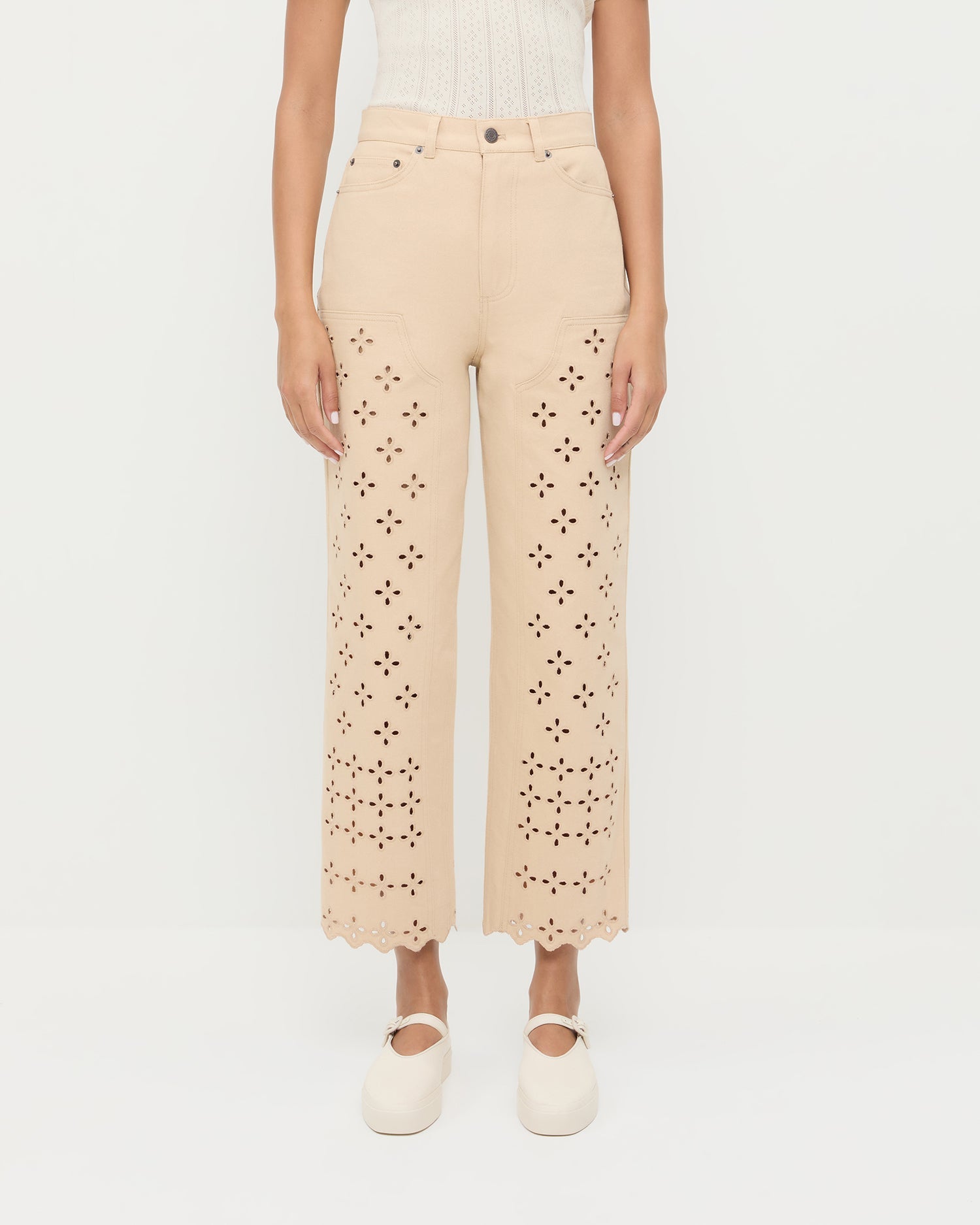 Demi Embroidered Pant in tan Japanese cotton twill with eyelet lace, Kerri Pointelle Tee in white cotton, and Cooper Natural Mary Jane Sneaker.
