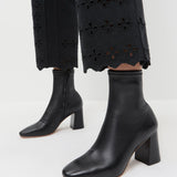 Elise Black Leather Stretch Ankle Bootie in black leather and Demi Embroidered Pant in Black.