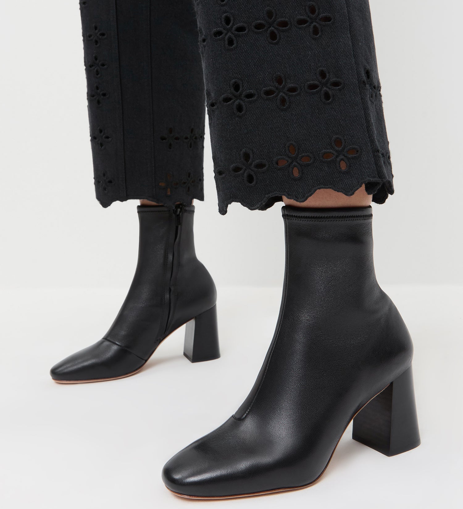 Elise Black Leather Stretch Ankle Bootie in black leather and Demi Embroidered Pant in Black.