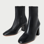Elise Black Leather Stretch Ankle Bootie in black leather.