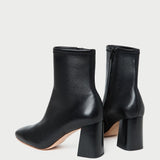 Elise Black Leather Stretch Ankle Bootie in black leather.