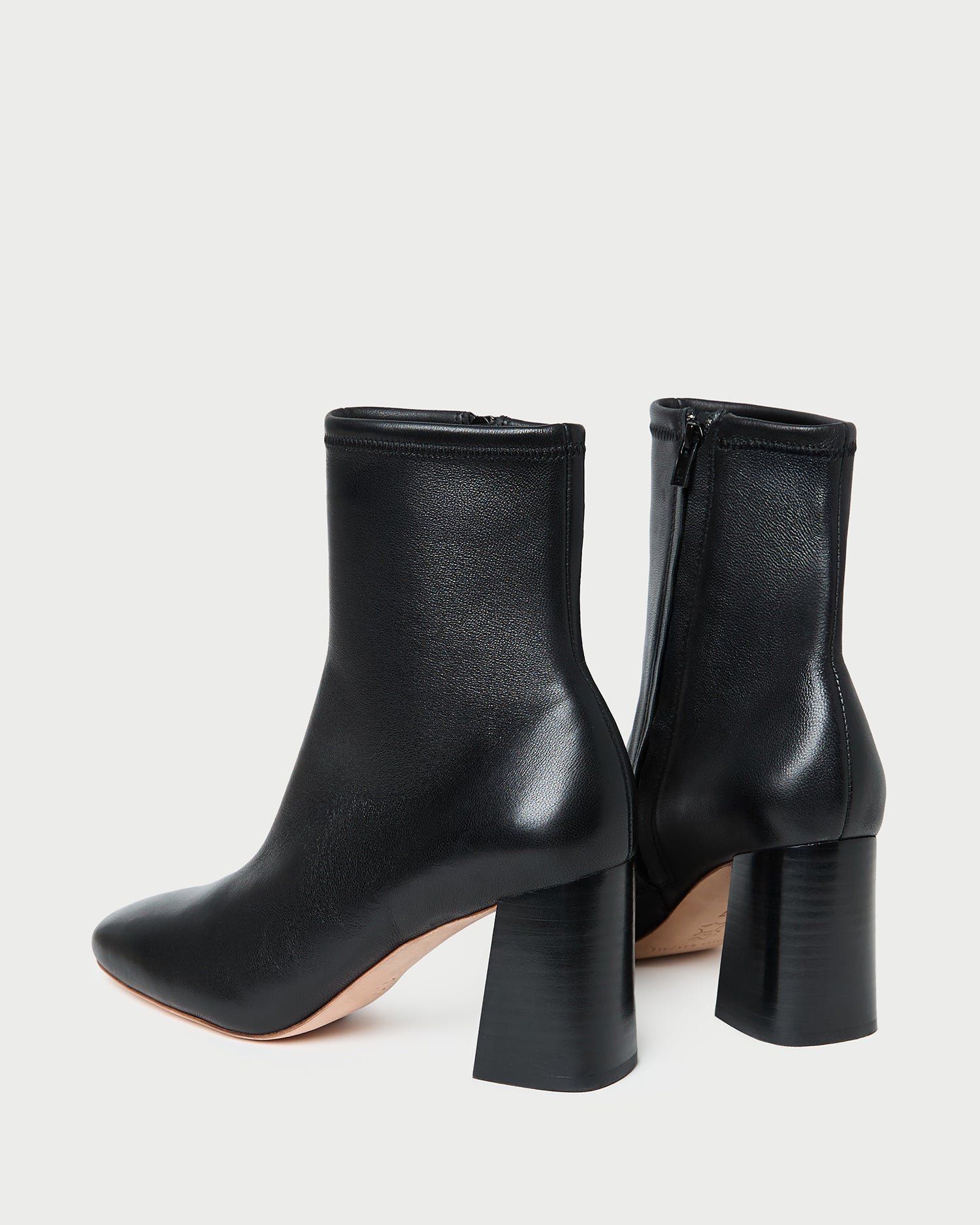 Elise Black Leather Stretch Ankle Bootie in black leather.