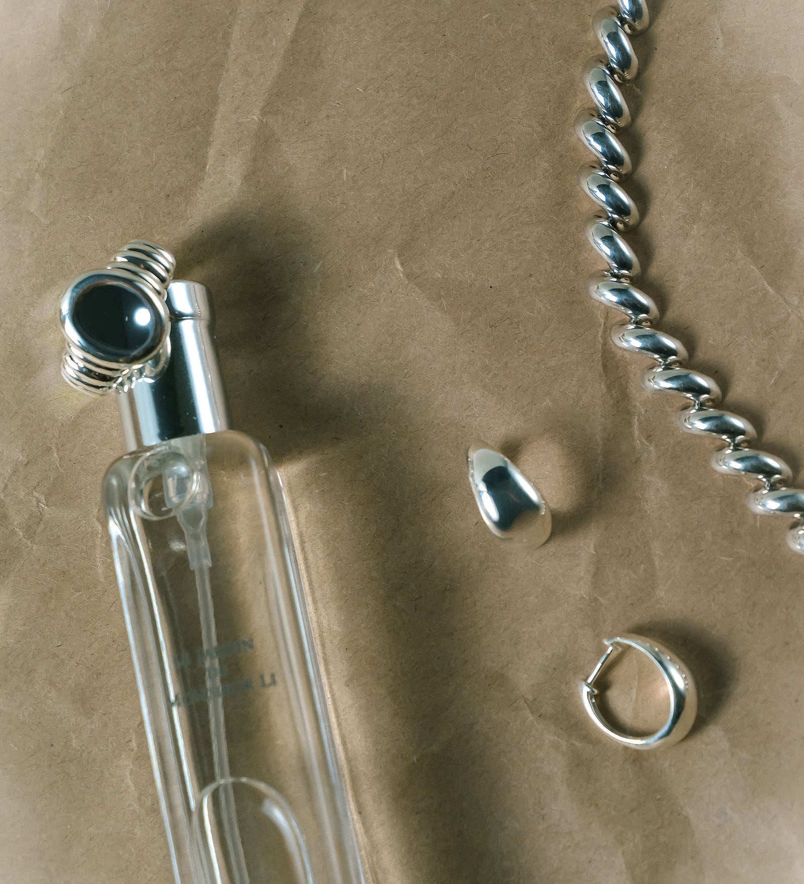 Kinn - Teardrop Hoop Earrings Silver
