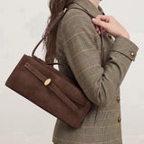 Veronica Beard Brown suede shoulder bag with gold hardware.