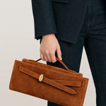 Veronica Beard Brown suede clutch with gold clasp.