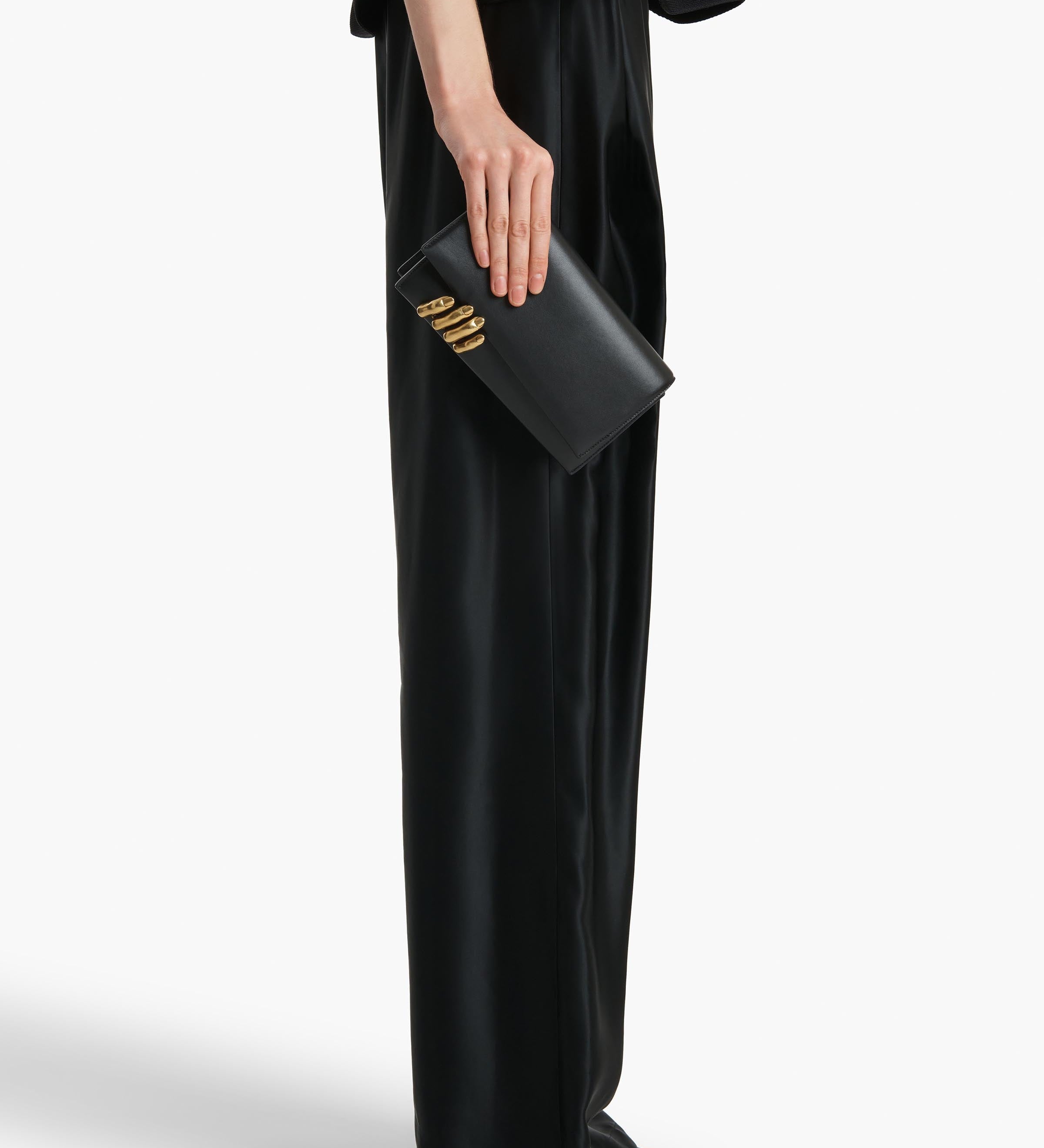 Khaite - Sculpted Hand Clutch in Black Leather