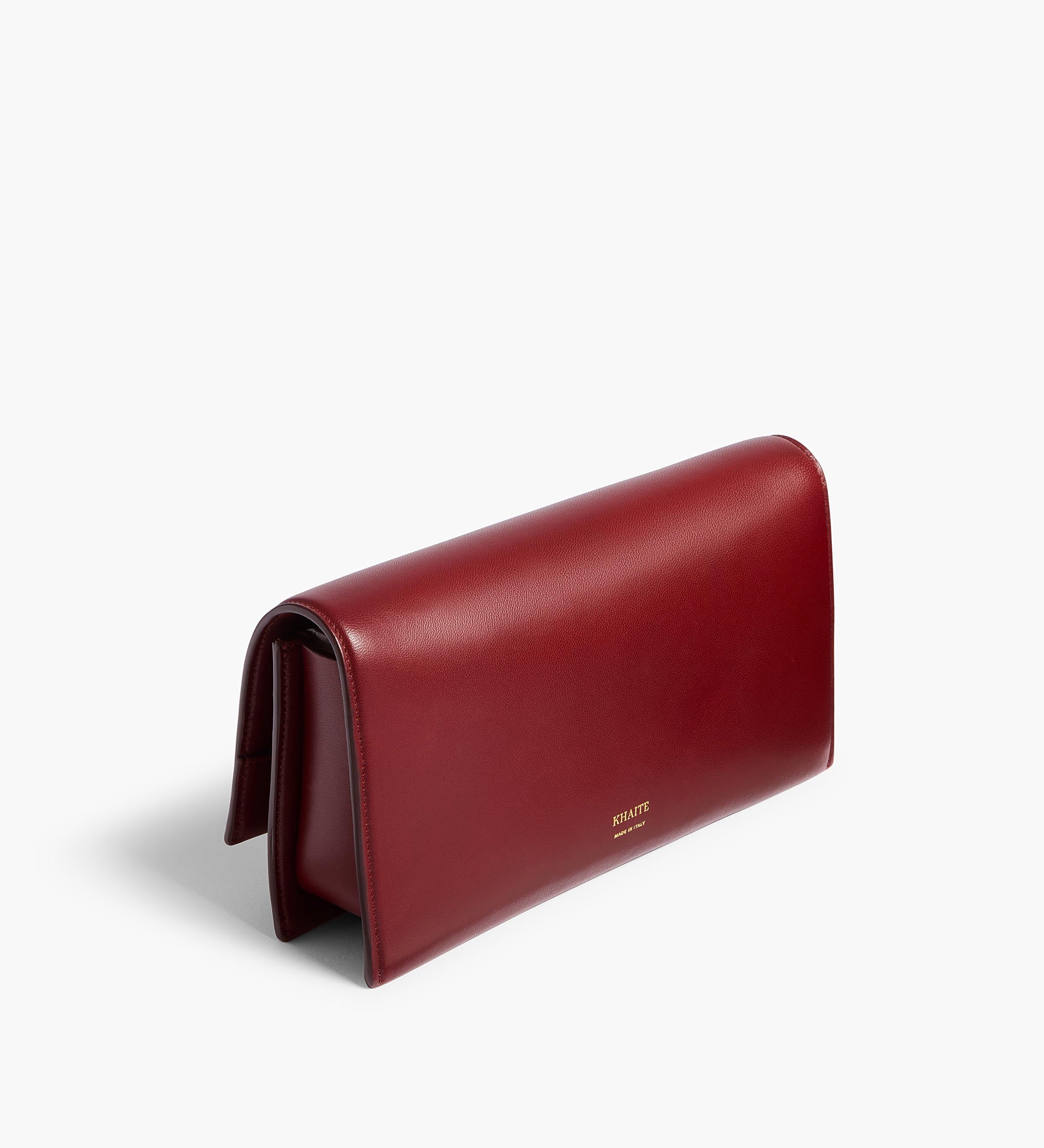 Khaite - Sculpted Hand Clutch in Oxblood Leather