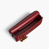 Khaite - Sculpted Hand Clutch in Oxblood Leather