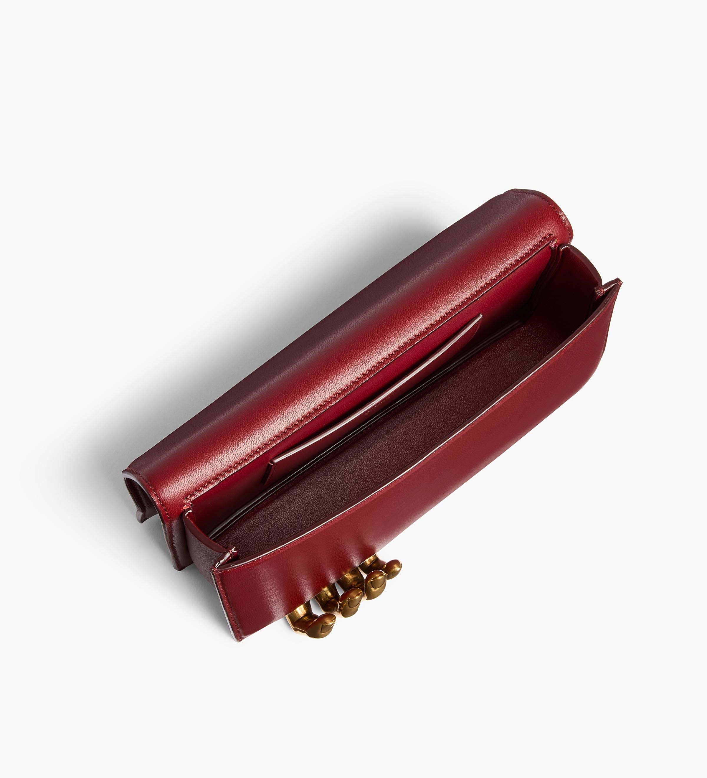 Khaite - Sculpted Hand Clutch in Oxblood Leather
