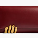 Khaite - Sculpted Hand Clutch in Oxblood Leather