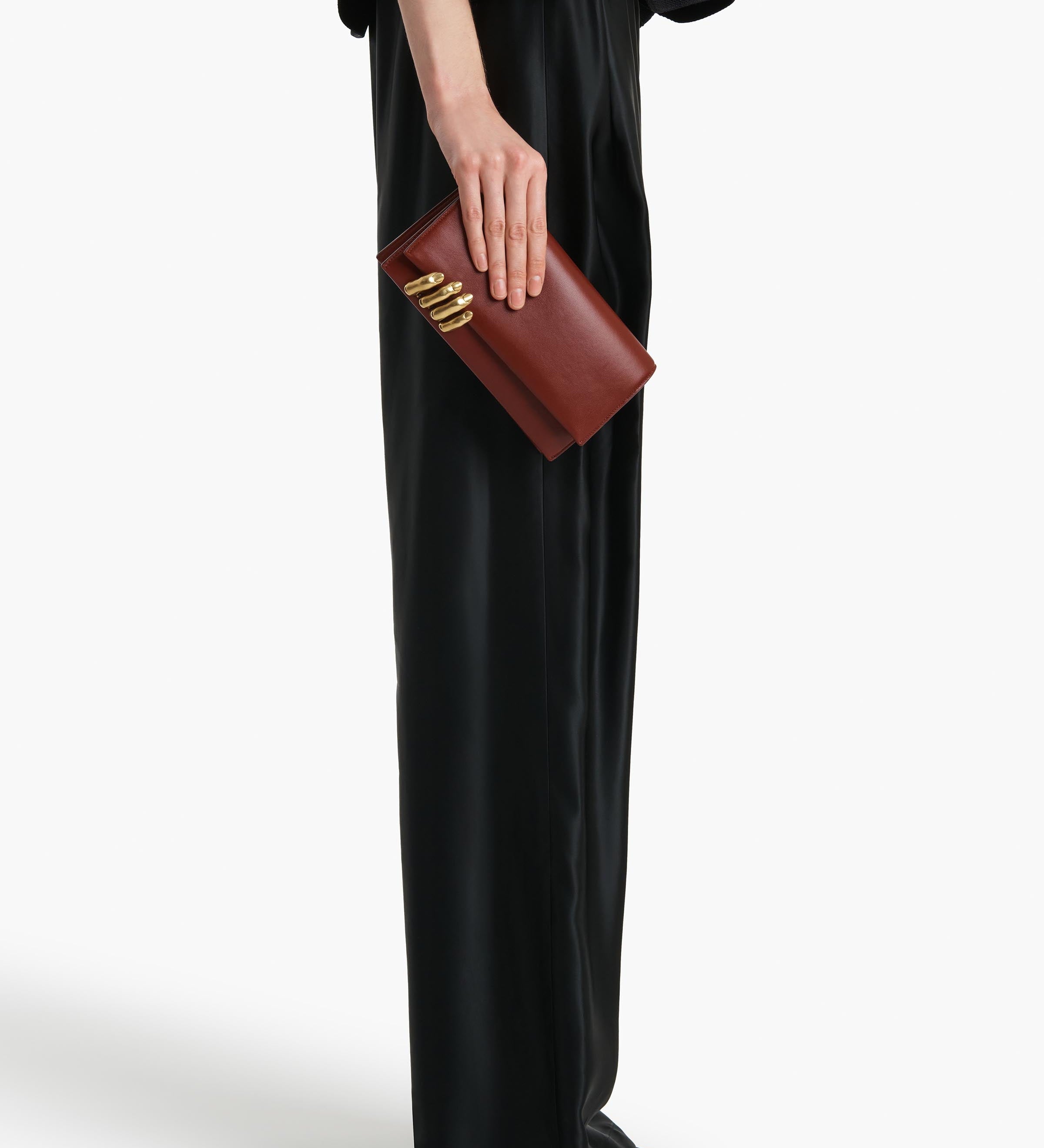 Khaite - Sculpted Hand Clutch in Oxblood Leather