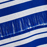 Blue and white horizontal striped knit fabric with fringe trim detail.