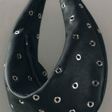 Khaite - Medium Olivia Hobo in Black Pebbled Leather with Grommets