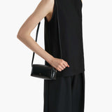 Khaite - Mini Kye Crossbody Bag in Black Crackle Patent Leather