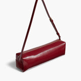 Khaite - Kye Shoulder Bag in Oxblood Crackle Patent Leather